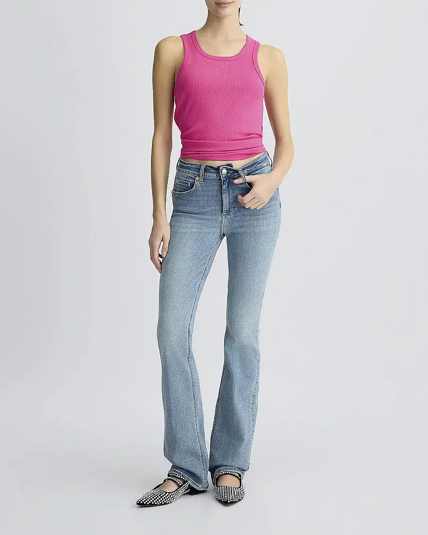 Jeans bootcut lavaggio medio super stone washed con rivetti con castoni applicati