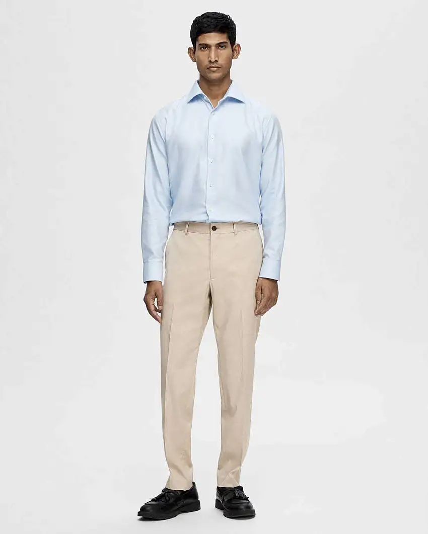 Pantaloni Cedric color sabbia slim-fit in tessuto armaturato di misto viscosa stretch con piega stirata