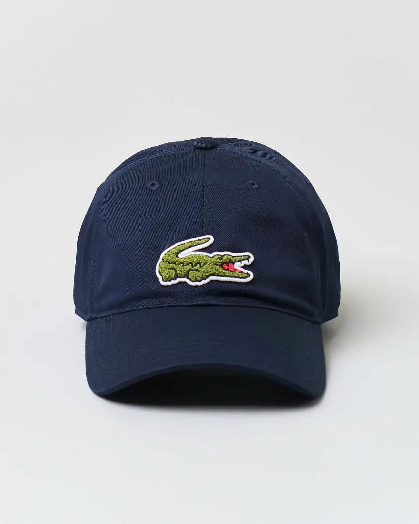 Berretto Lacoste blu con frontino e maxi coccodrillo verde ricamato