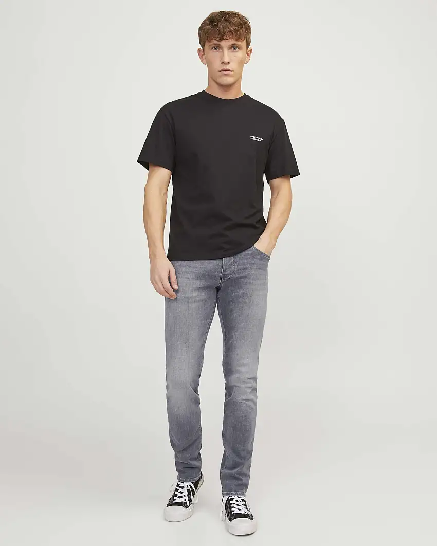 Jeans slim a vita bassa grigio in cotone stretch stone washed con schiariture e baffature