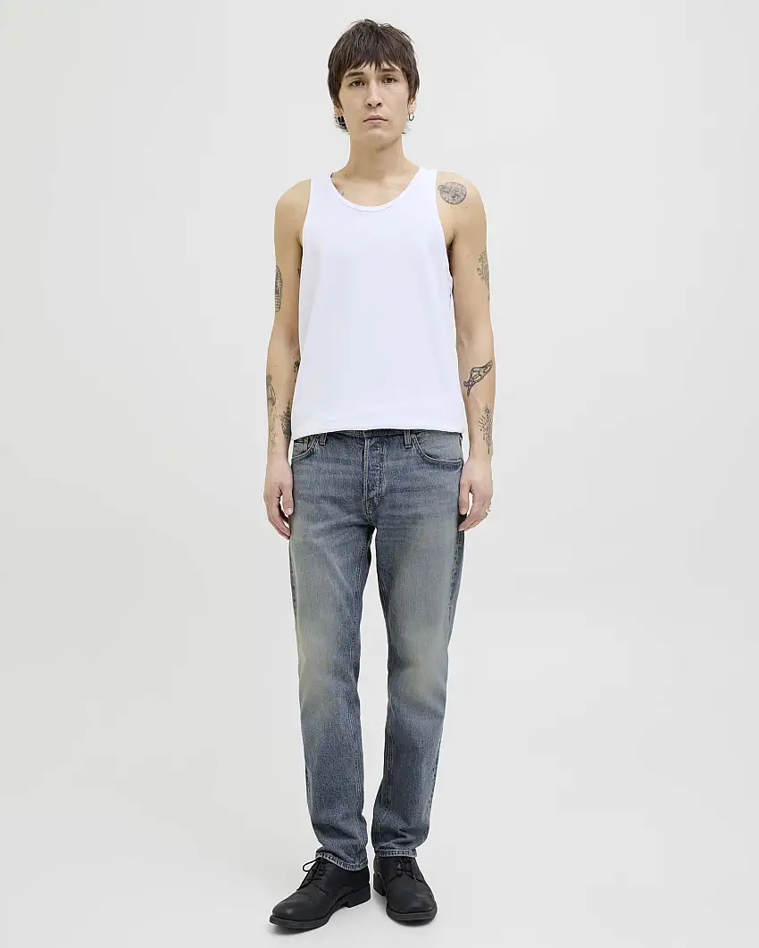 Jeans comfort-fit a vita media in cotone stretch lavaggio medio con ingialliture e baffature