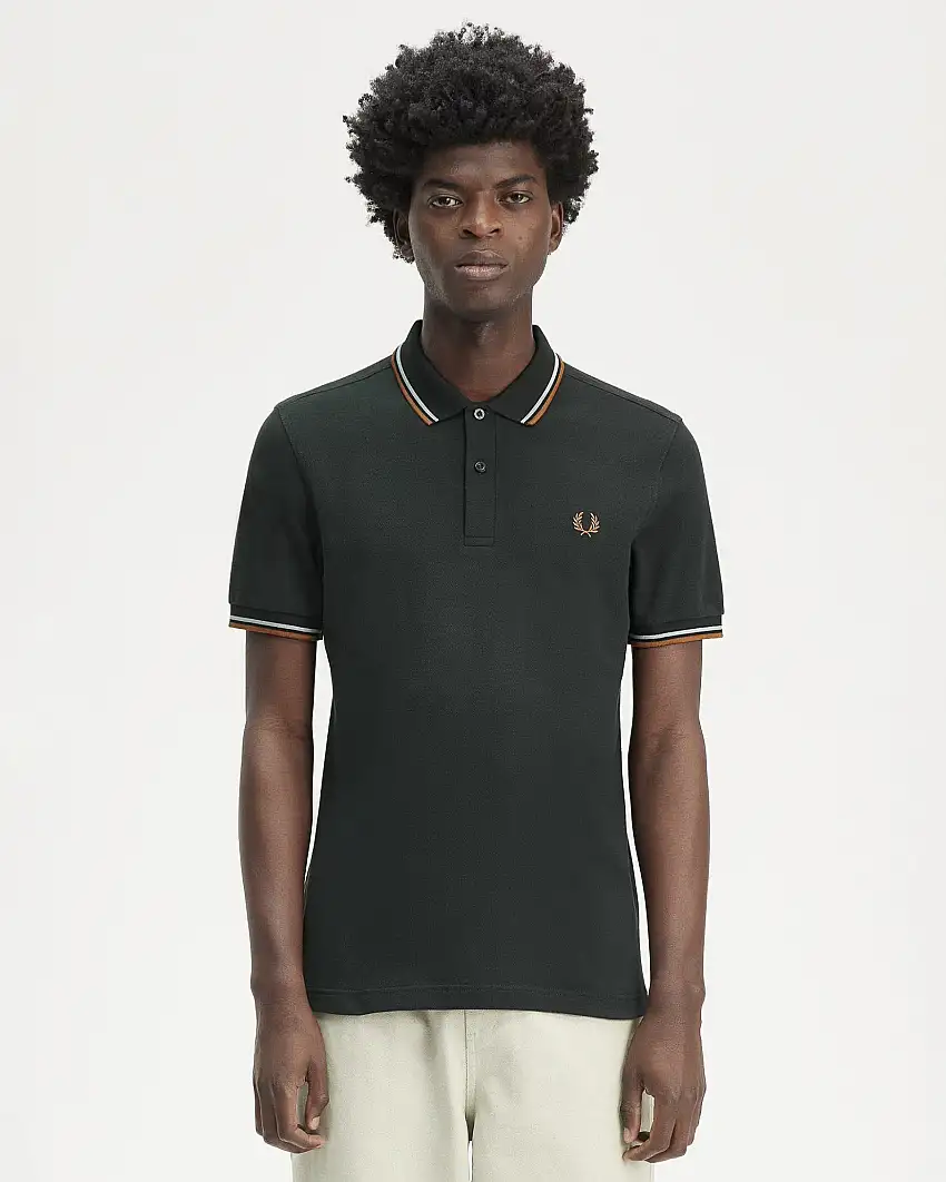 Polo verde scuro mezza manica con bordino bianco e arancione