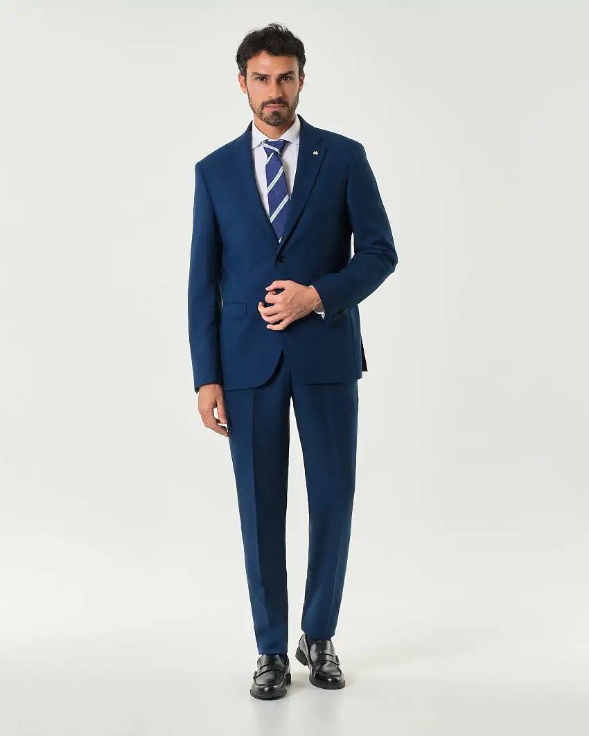 Abito blu royal in tela di misto lana stretch con rever a lancia
