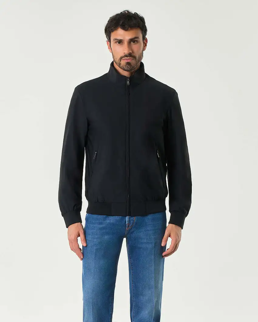 Bomber nero in tessuto tecnico stretch