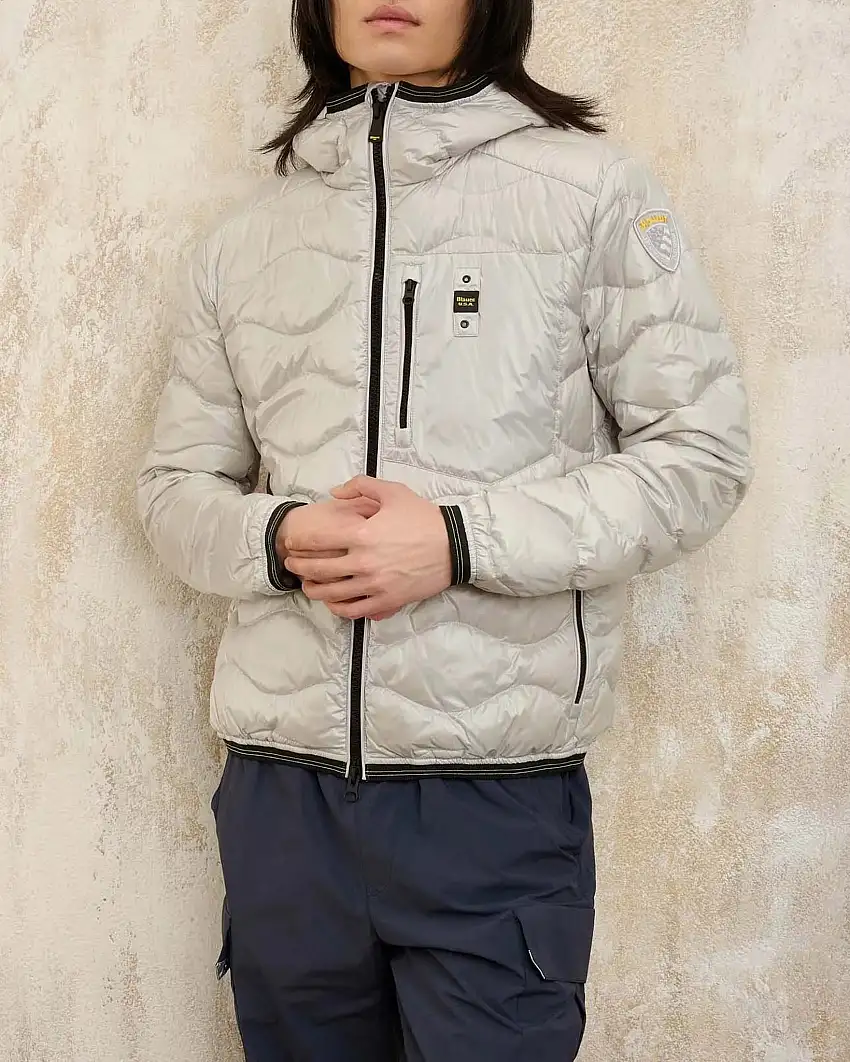 Piumino Wave grigio chiaro 100 grammi con cappuccio e trapuntatura ad onde