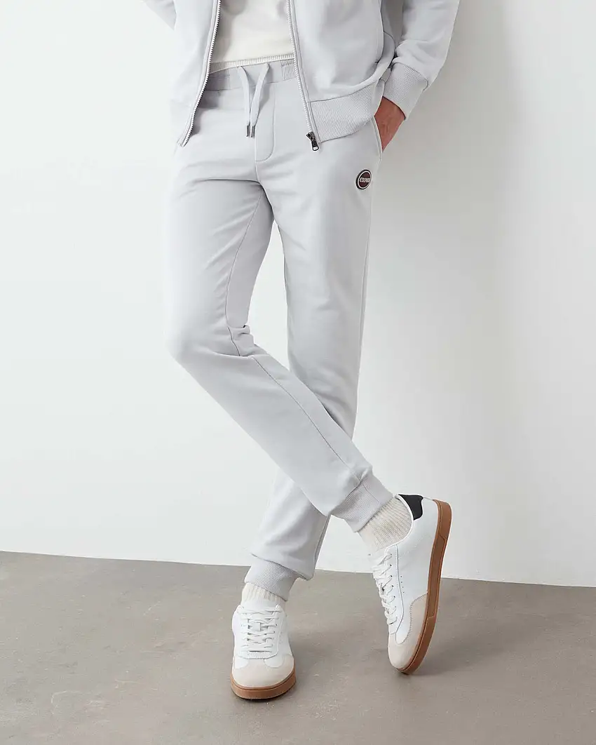 Pantalone ghiaccio in felpa di cotone con logo bollo applicato