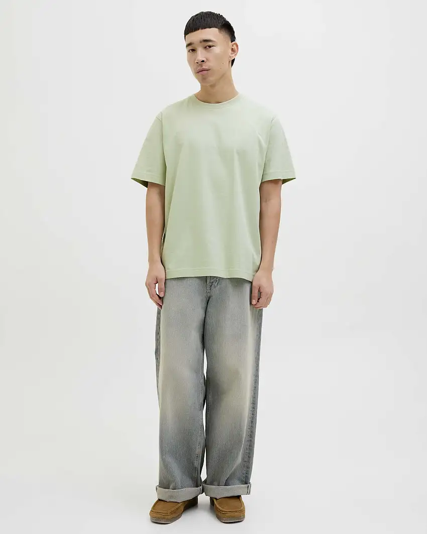 T-shirt verde salvia relaxed-fit in puro cotone con stampa grafica floreale sul retro