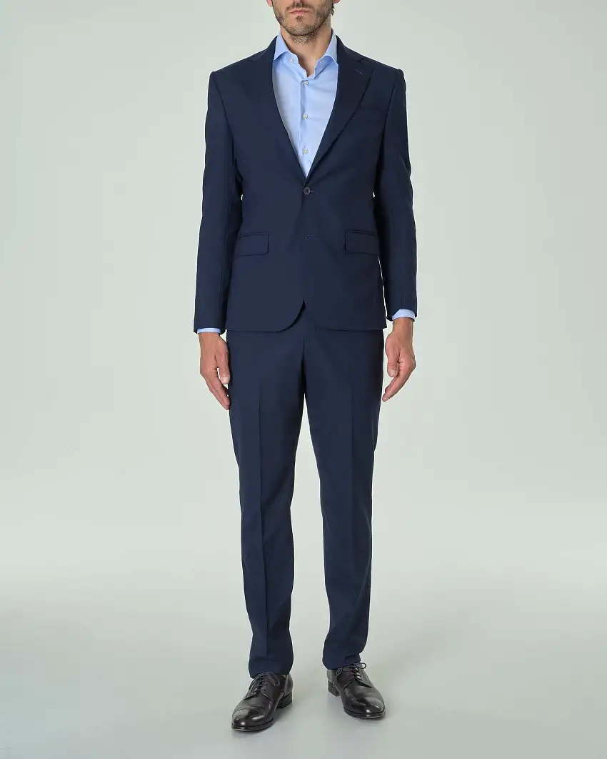 Abito blu in tela di lana stretch con rever a lancia