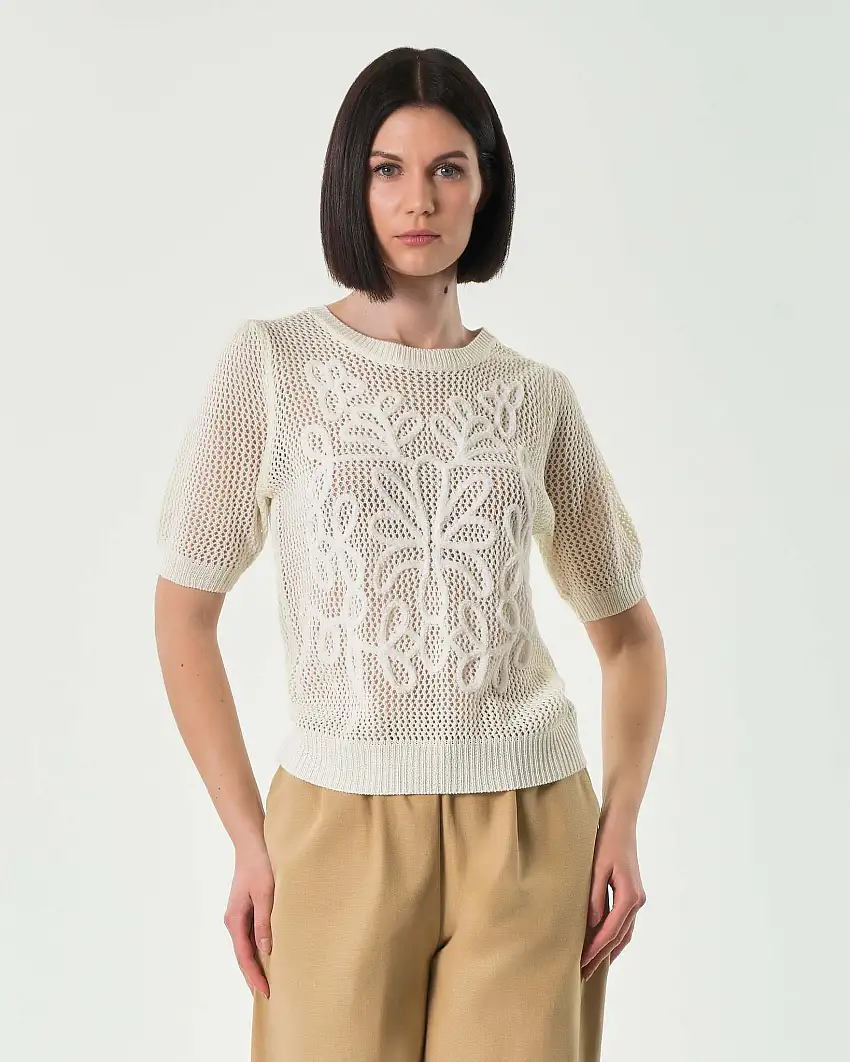 Maglia bianca a rete in misto cotone a rete con ricamo a rilievo tono su tono