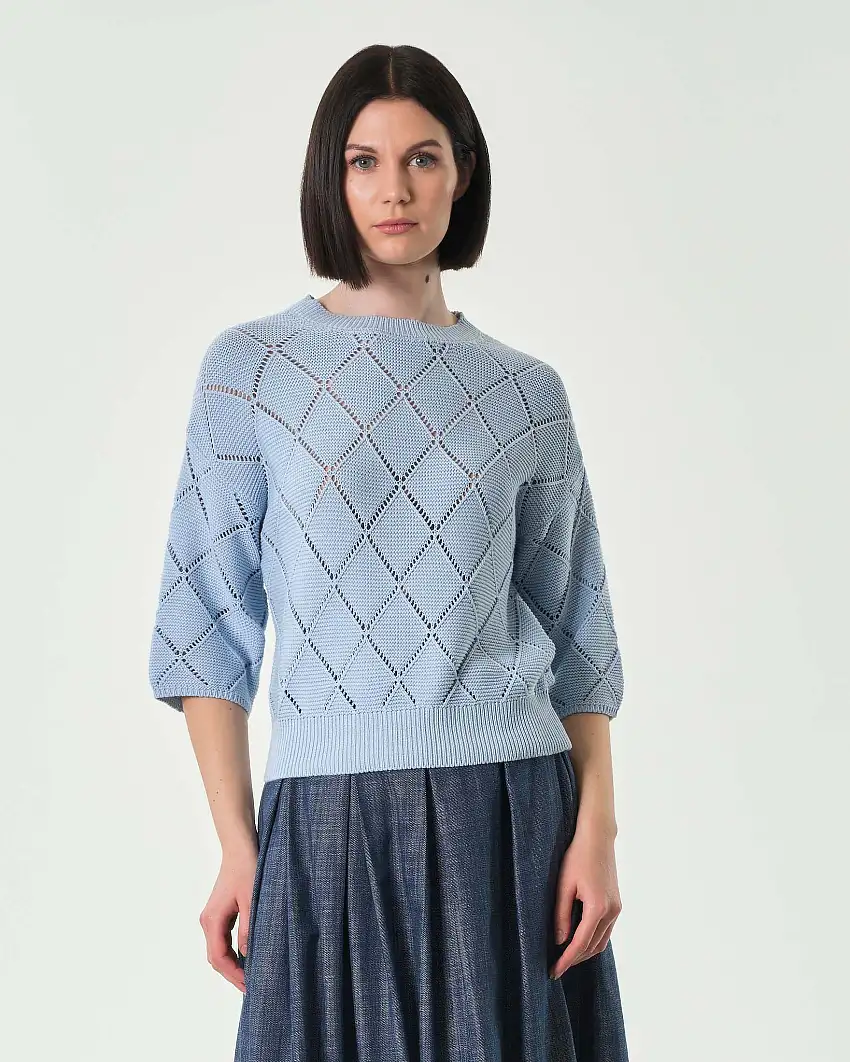 Maglia azzurra in misto cotone a lavorazione punzonata a rombi