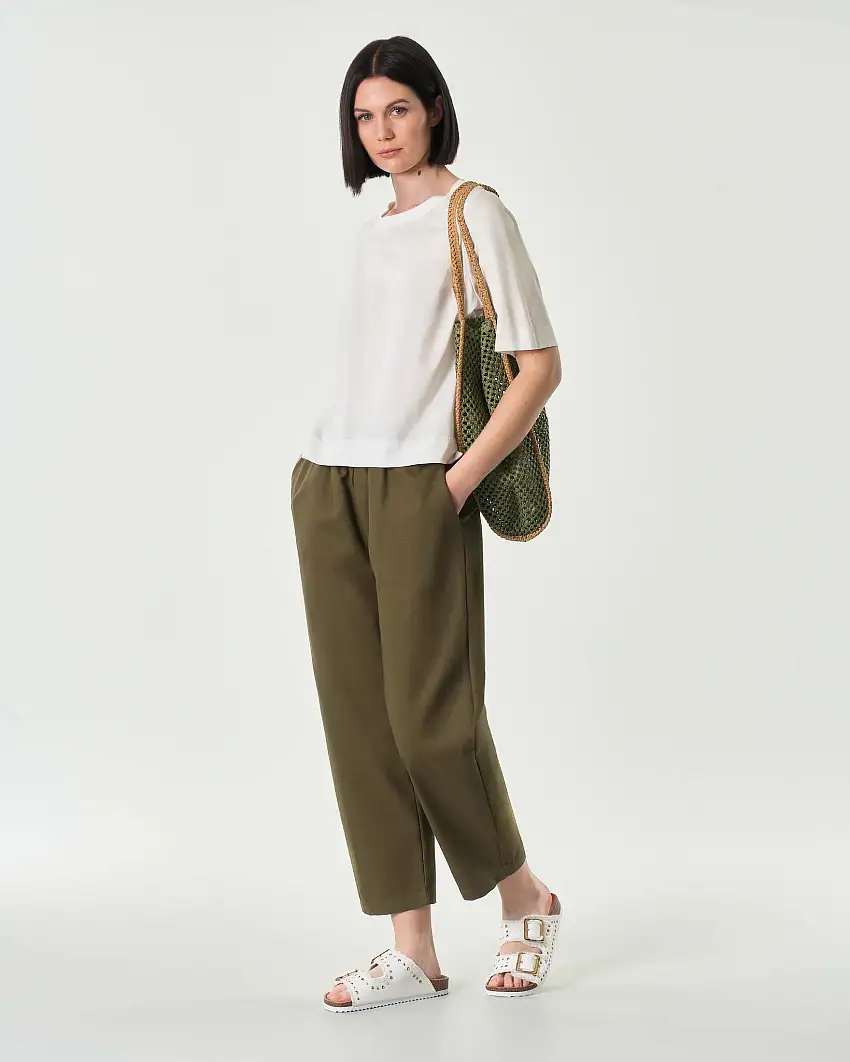 Pantaloni baloon verde militare in canvas di cotone con elastico in vita