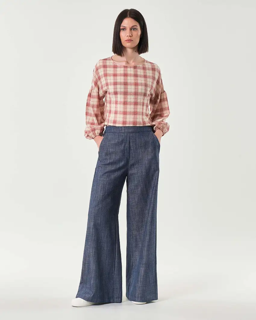 Pantaloni palazzo blu in denim di cotone con elastico inserito in vita sul retro