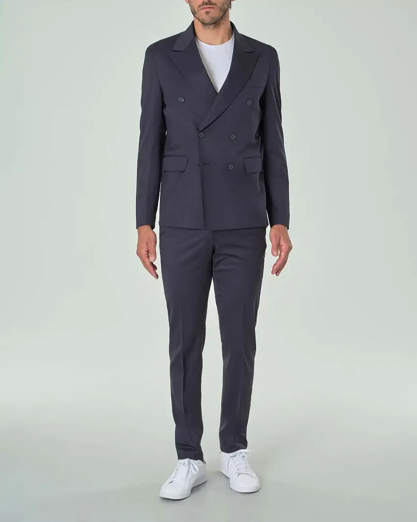 Abito blu doppiopetto in tela di lana stretch con rever a lancia