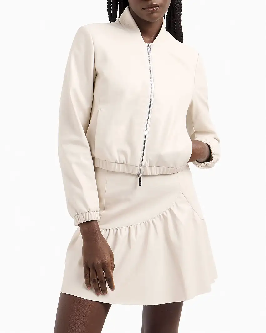 Bomber corto beige Armani Exchange in similpelle con elastico inserito al fondo