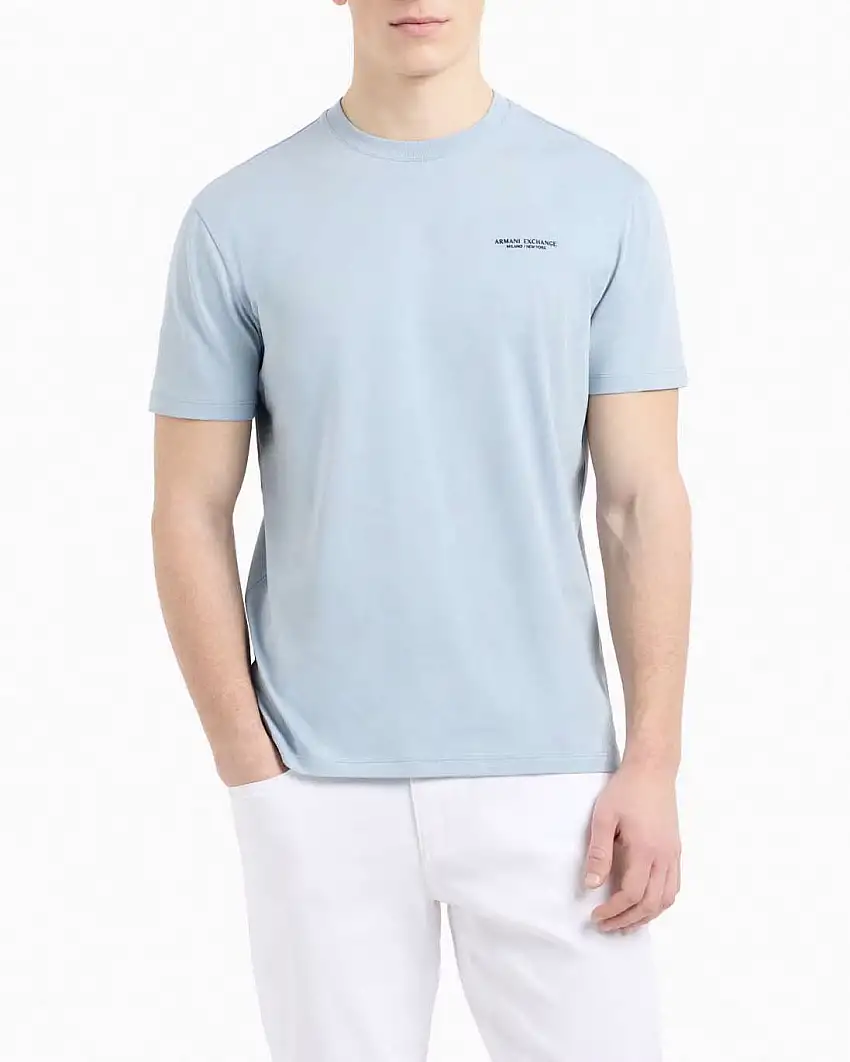 T-shirt mezza manica Armani Exchange azzurra tinta unita con logo piccolo stampato sul petto