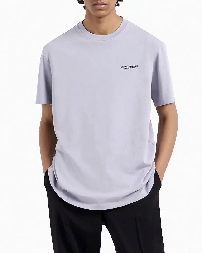 T-shirt mezza manica Armani Exchange lilla tinta unita con logo piccolo stampato sul petto