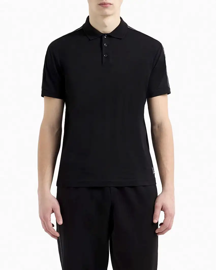 Polo EA7 nera in jersey di cotone con tape porta logo sulle spalle