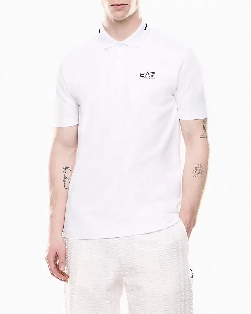 Polo EA7 bianca in micro piquet di cotone stretch con bordino in contrasto