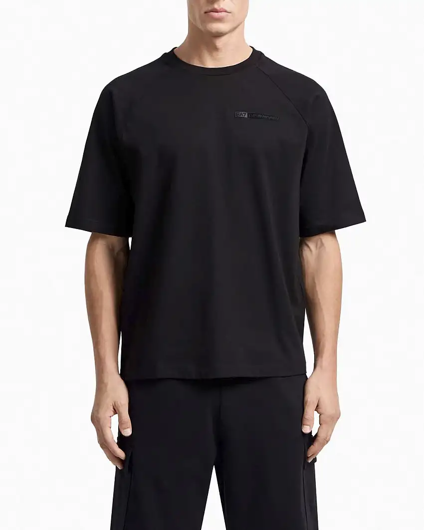 T-shirt EA7 nera in puro cotone con tape sul petto e inserto in mesh sul retro