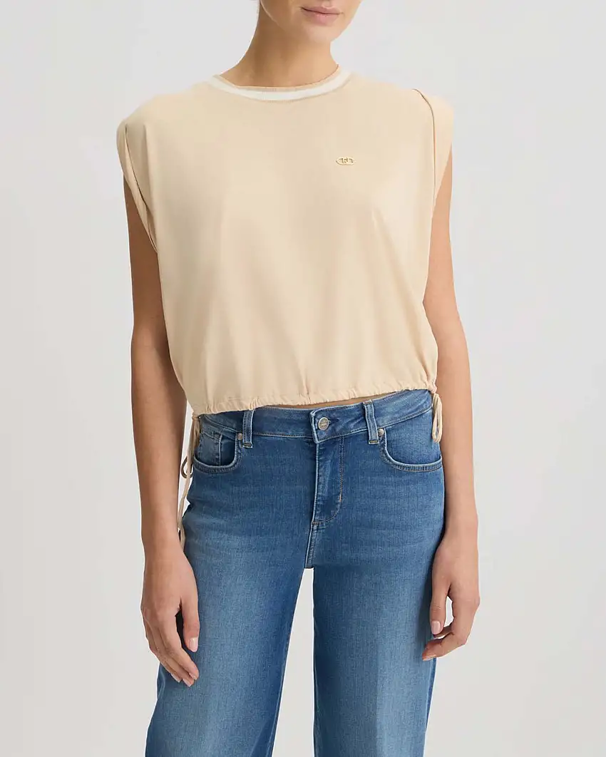 T-shirt beige cropped Liu Jo Sport senza maniche con coulisse al fondo e scollo bicolore