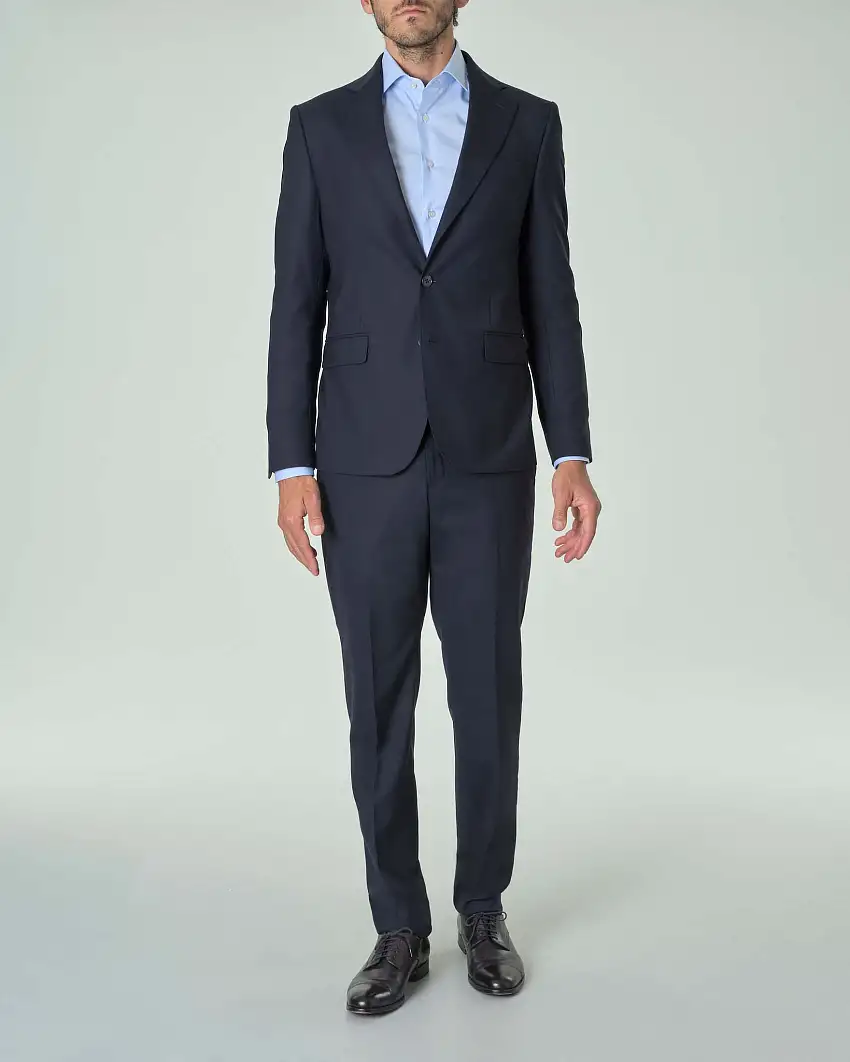 Abito blu notte in tela di lana stretch con rever a lancia