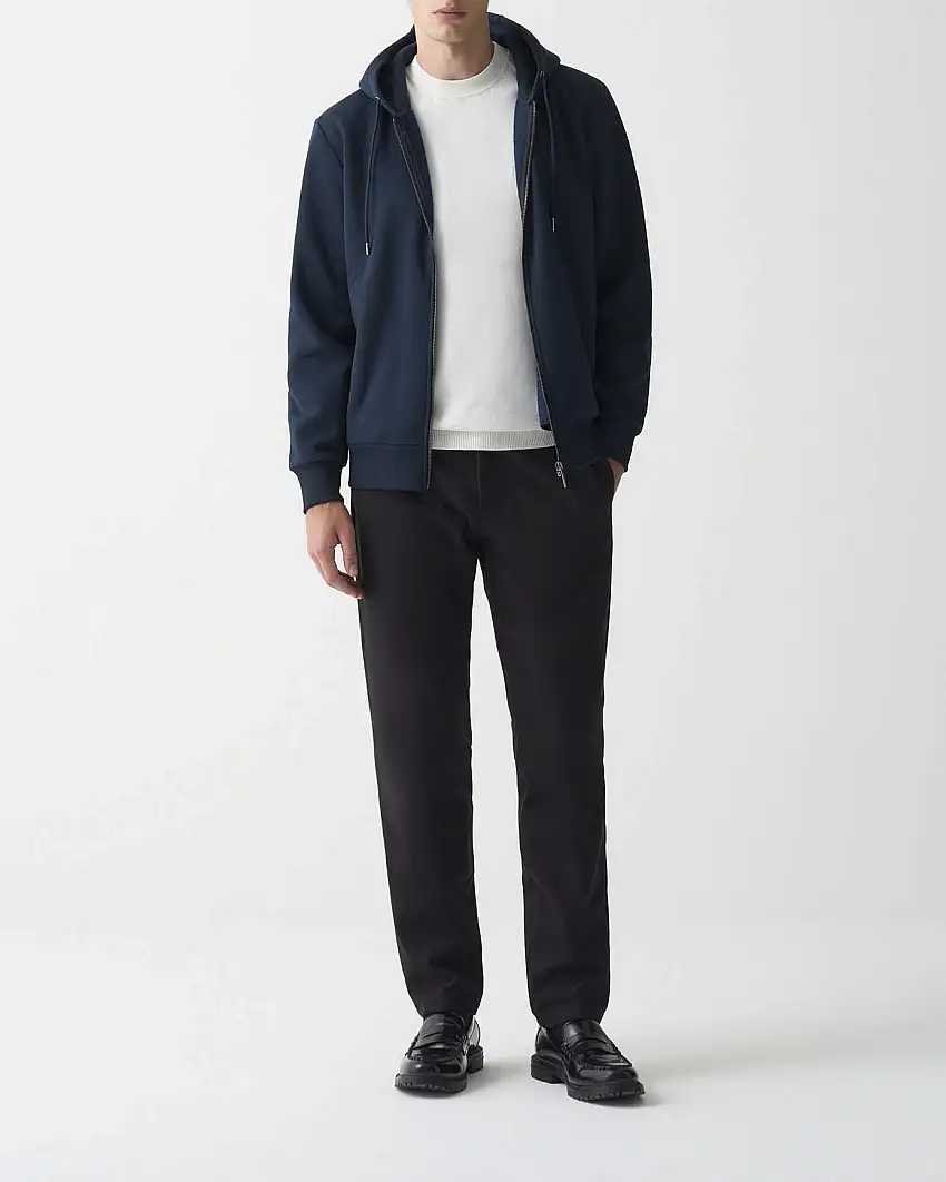 Felpa Colmar Originals blu con cappuccio chiusura zip e logo bollo applicato sulla manica