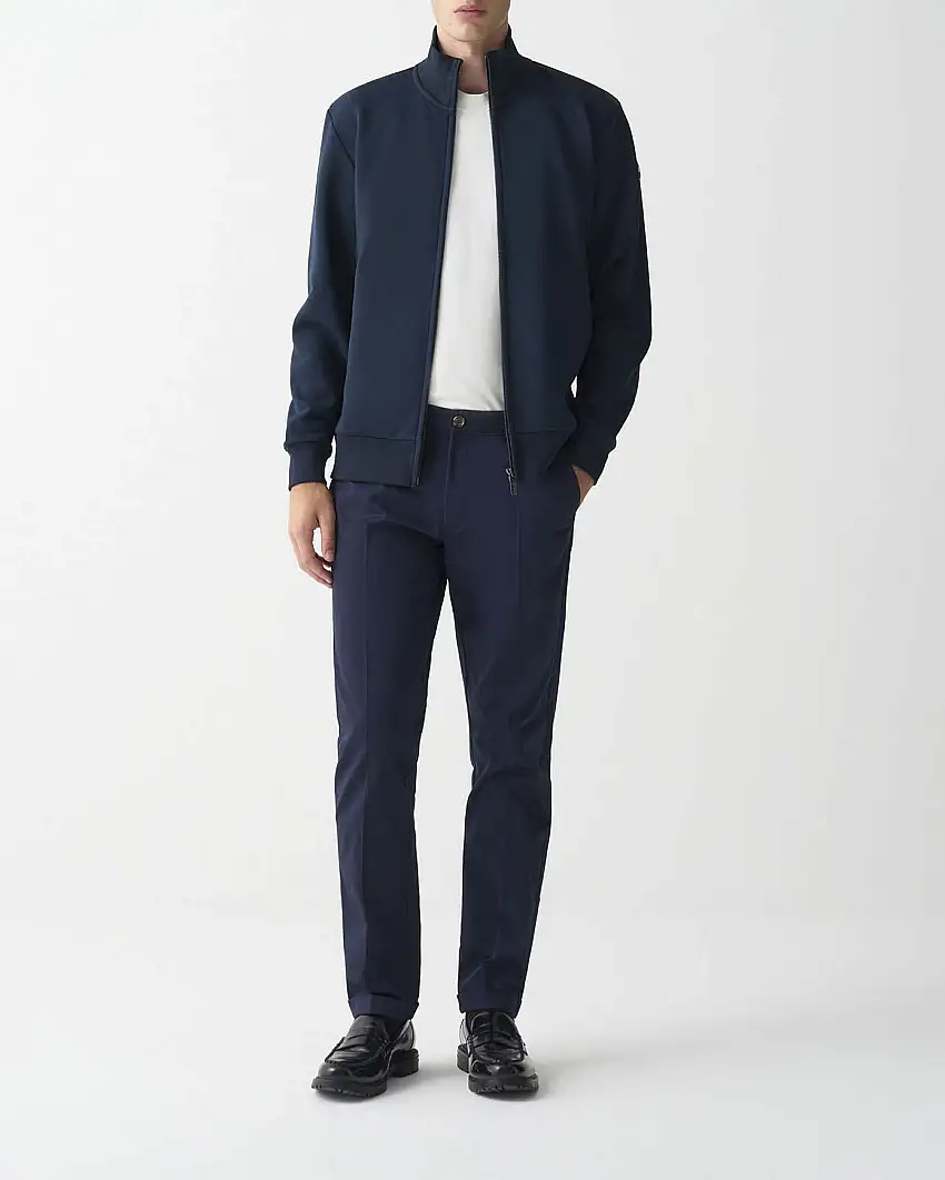 Felpa Colmar Originals blu con chiusura zip e logo bollo applicato sulla manica