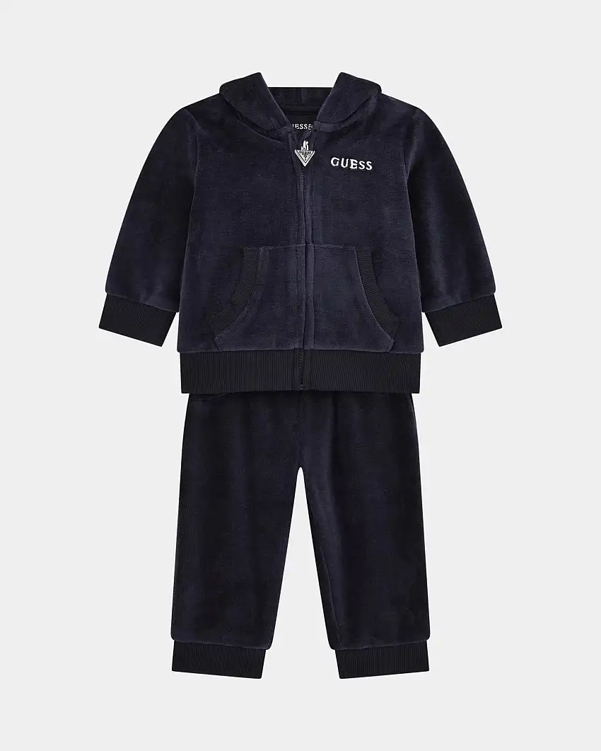 Tuta blu in ciniglia composta da felpa con cappuccio e chiusura zip e da pantalone