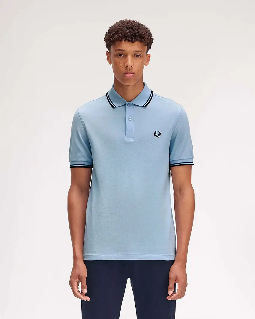 Polo Fred Perry azzurra mezza manica con bordino blu e ottanio
