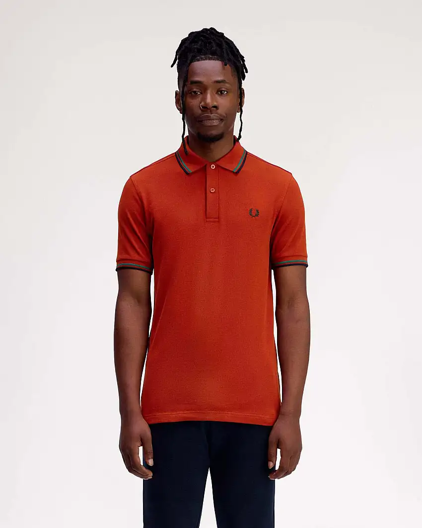 Polo Fred Perry arancione mezza manica con bordino verde acqua e blu