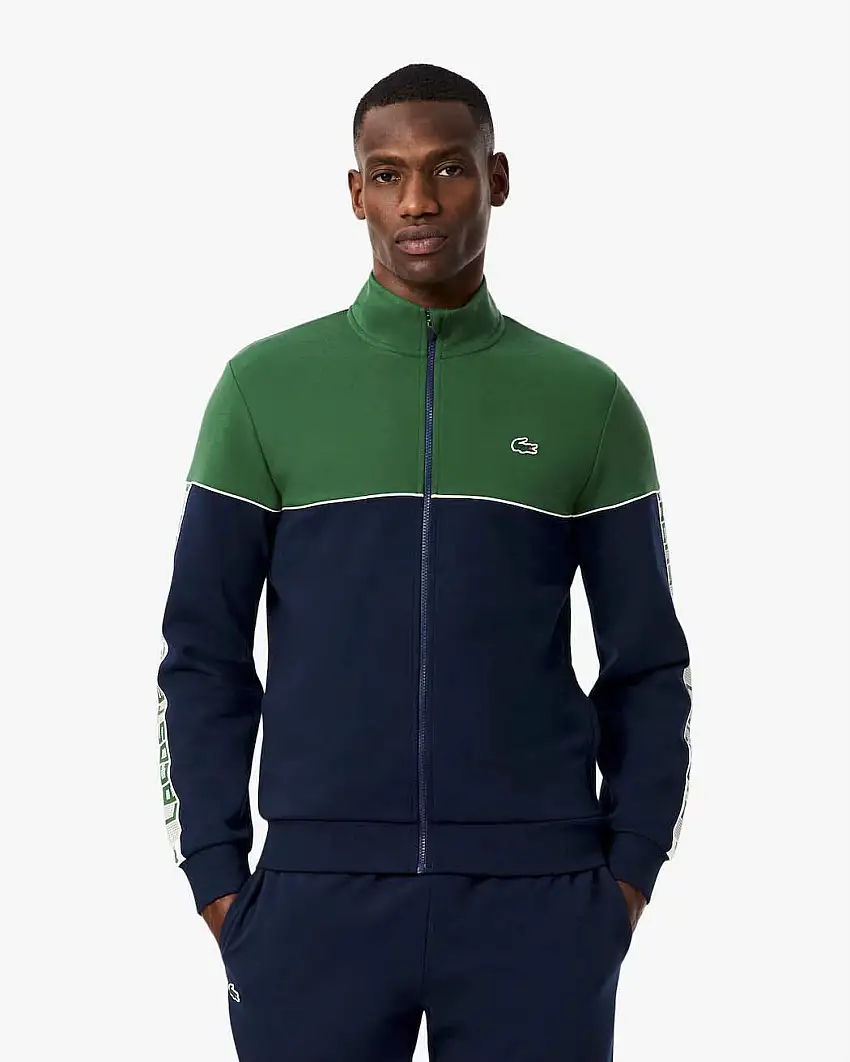 Felpa Lacoste color block verde e blu con piping porta logo e chiusura zip